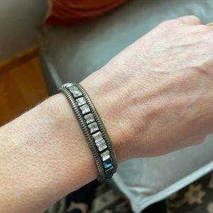 Lionette by Noa Sade bracelet in yellow metal with stones.